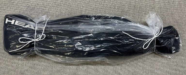 Example of packed ski and snowboard
